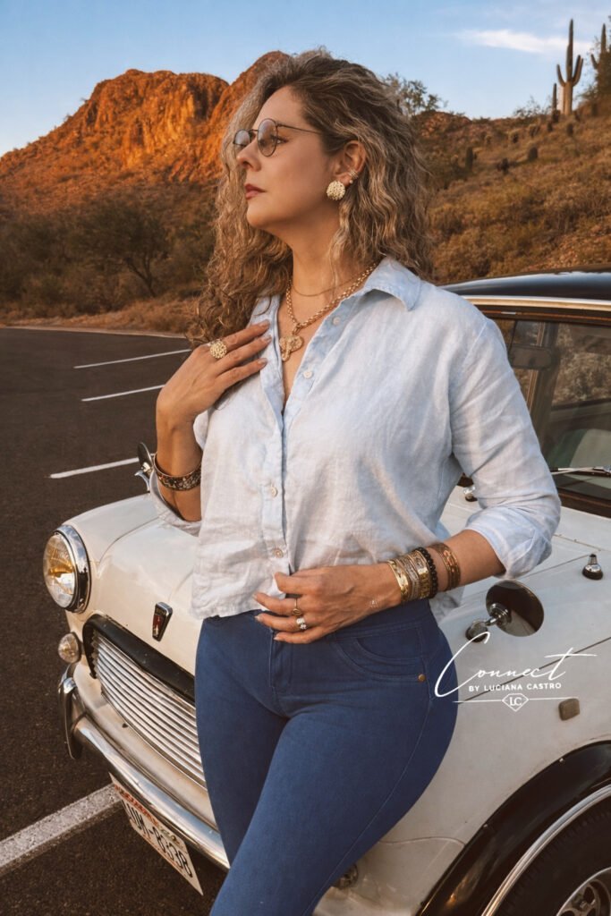 Luciana beside her original white Mini